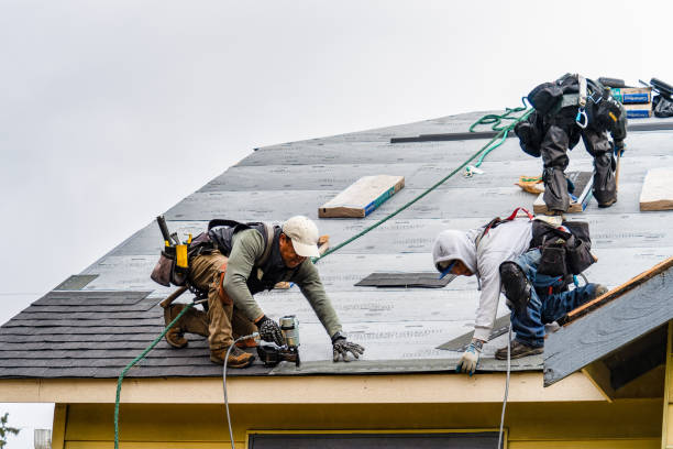 Professional Gutter Installation technician working in Elmhurst, PA